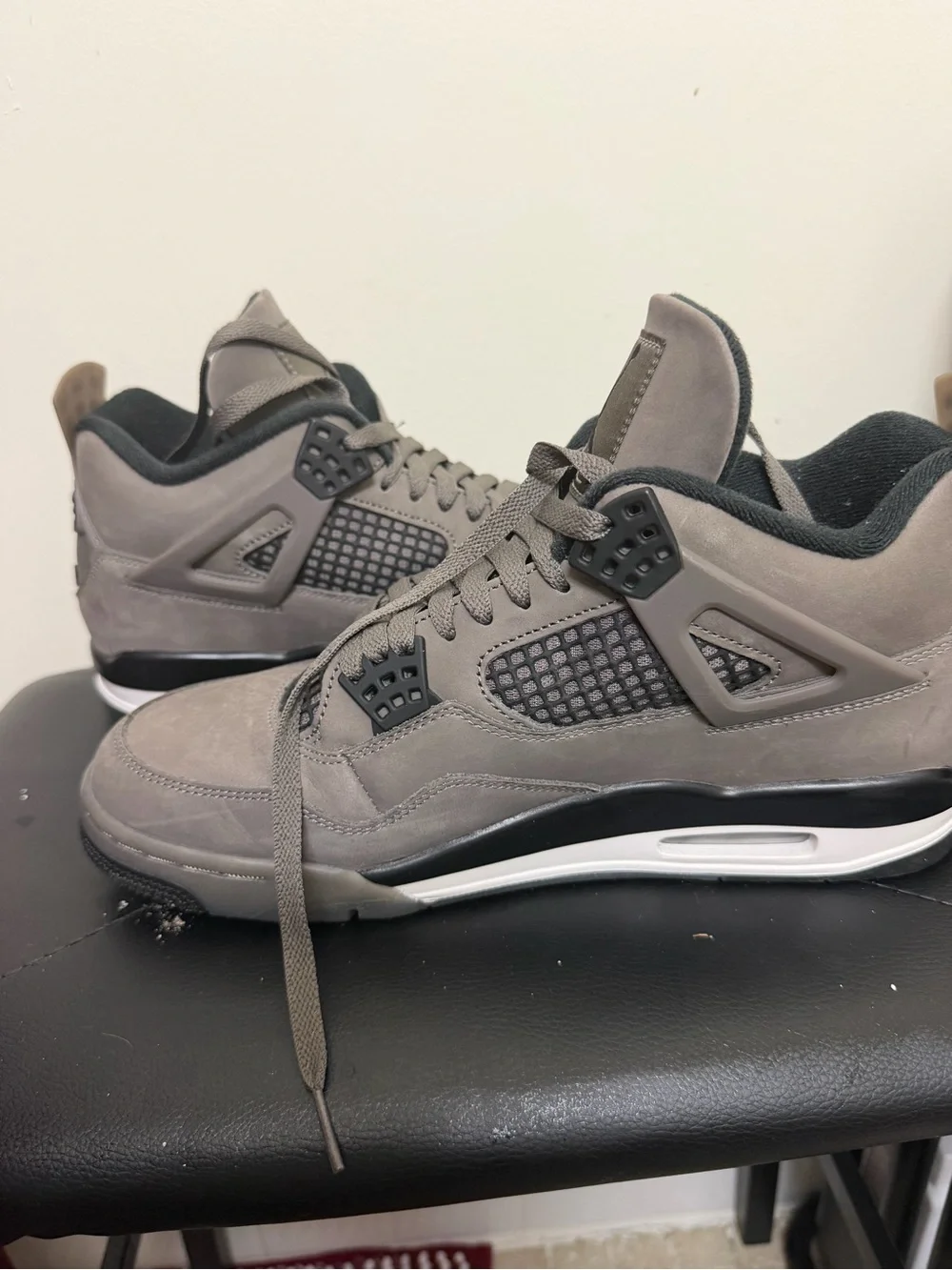 Jordan Retro 4 Sneakers in Grey and Black
